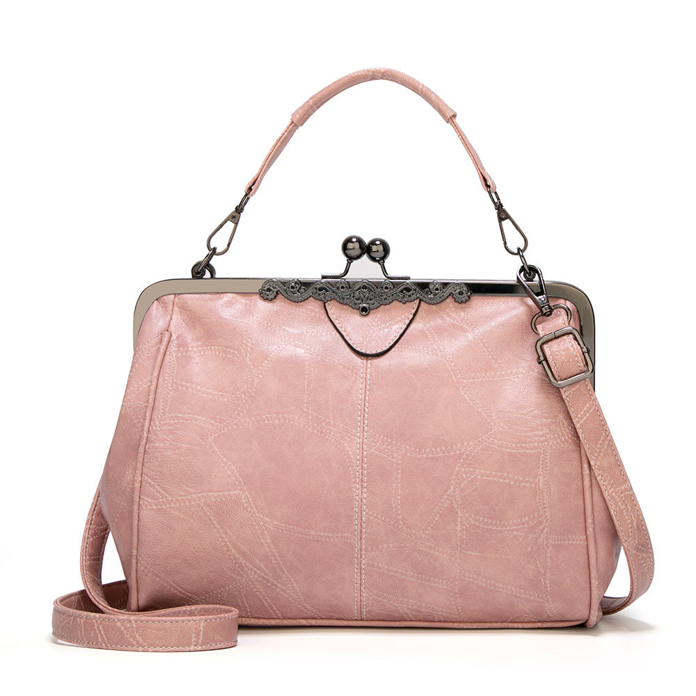 ViaNela® | Bolsa de mano vintage con charm clásico
