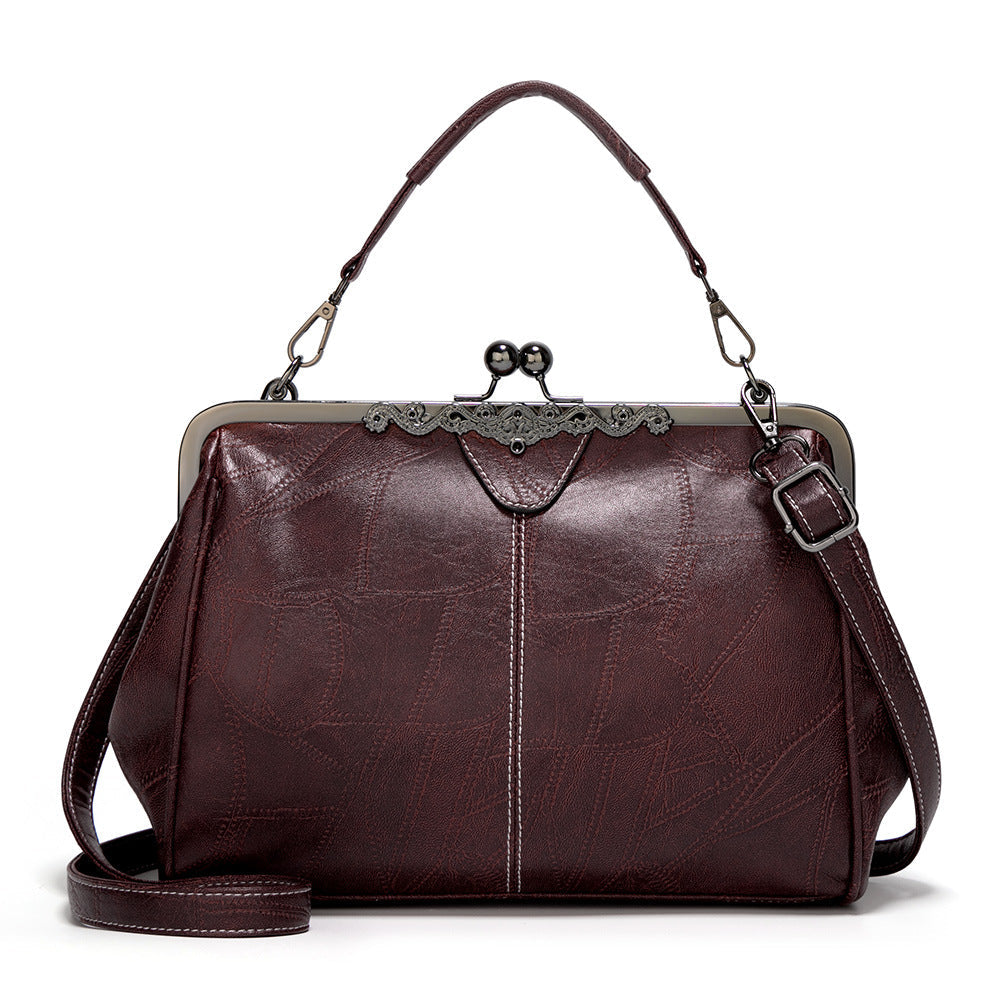 ViaNela® | Bolsa de mano vintage con charm clásico