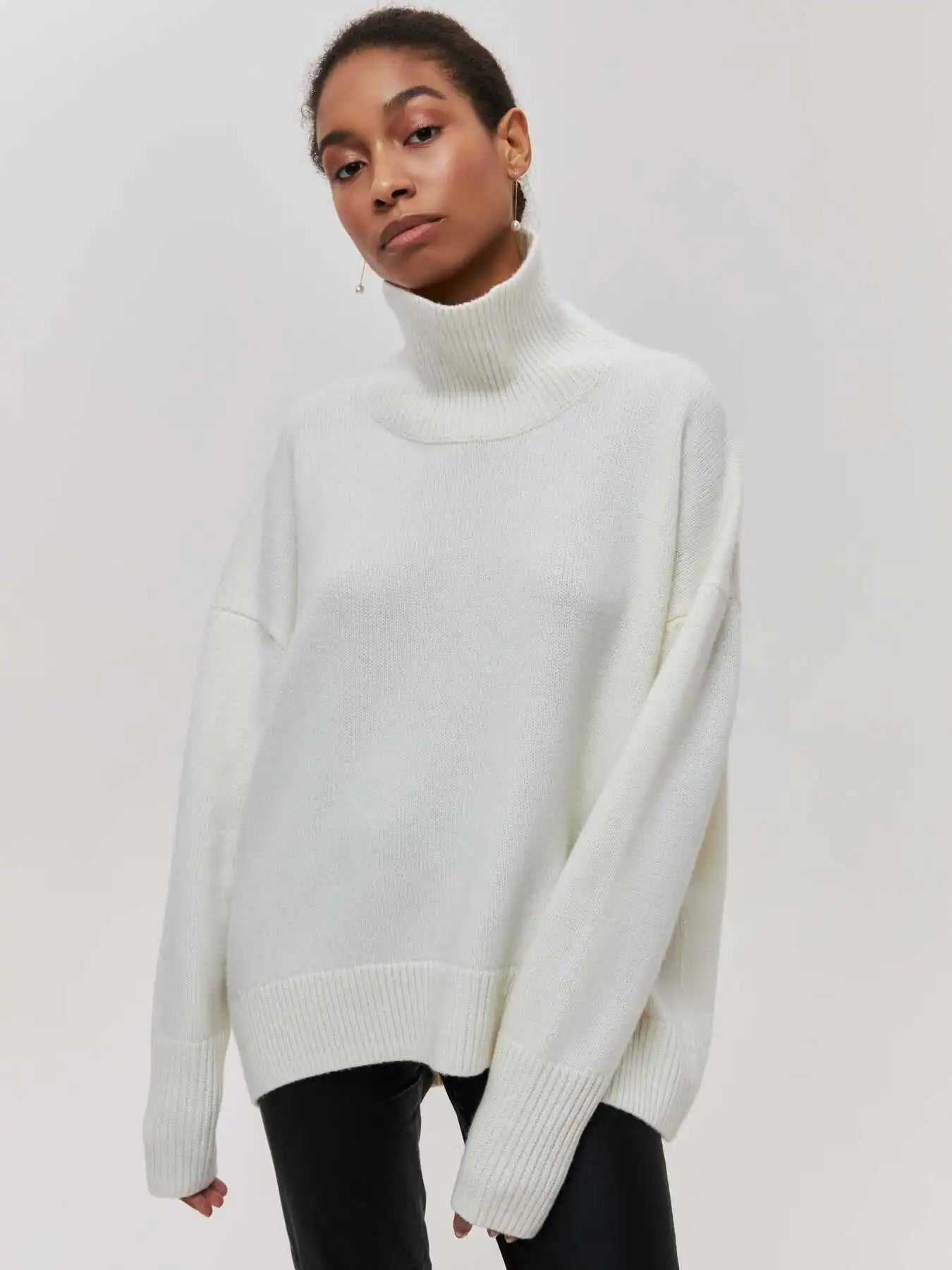 Eden - Suéter de punto con cuello alto oversized y elegante