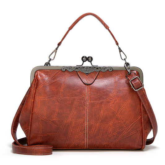 ViaNela® | Bolsa de mano vintage con charm clásico