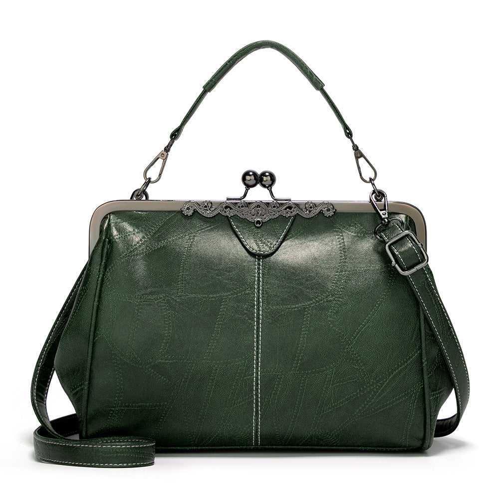ViaNela® | Bolsa de mano vintage con charm clásico