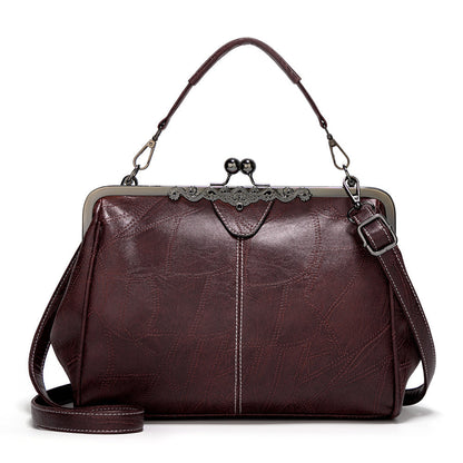 ViaNela® | Bolsa de mano vintage con charm clásico